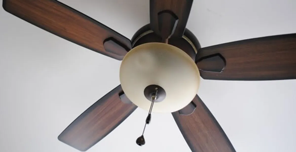 Fully installed ceiling fan with balanced blades and light fixture in Cambridge, MA
