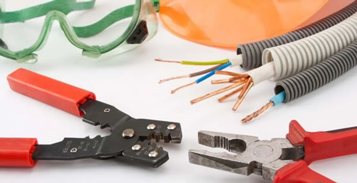 Electrical wiring repair with professional tools and safety equipment in Charlestown, MA