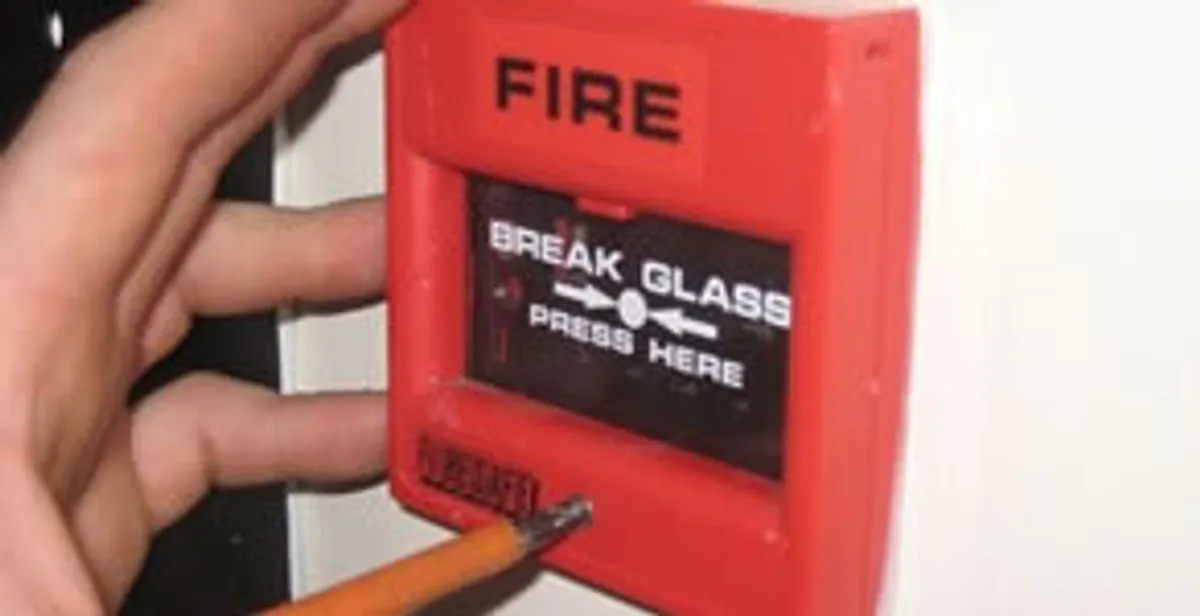 fire alarm installation service showing manual fire alarm pull station installed by licensed electricians in Cambridge, MA